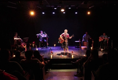 Ch'umilkaj and her band